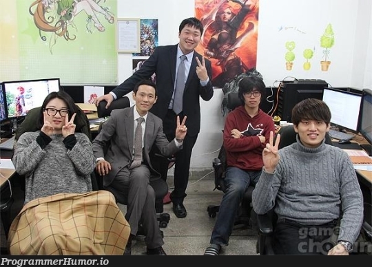 Picture of Korean mobile game startup. Can you spot the main programmer? | programmer-memes, program-memes, startup-memes | ProgrammerHumor.io