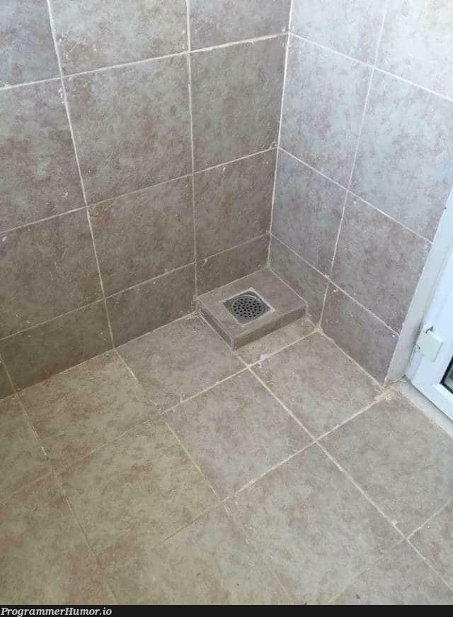 Dev 1: Completed installing tiles, Dev 2: Successfully installed water exhaust feature | feature-memes | ProgrammerHumor.io