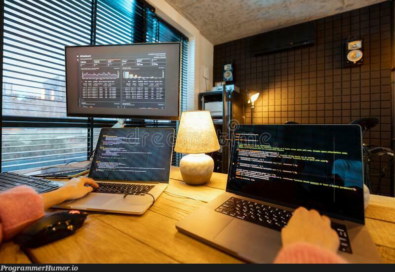 Most skilled dev right there, coding in two devices at the same time. Stock images amaze me more and more every day | coding-memes, image-memes | ProgrammerHumor.io