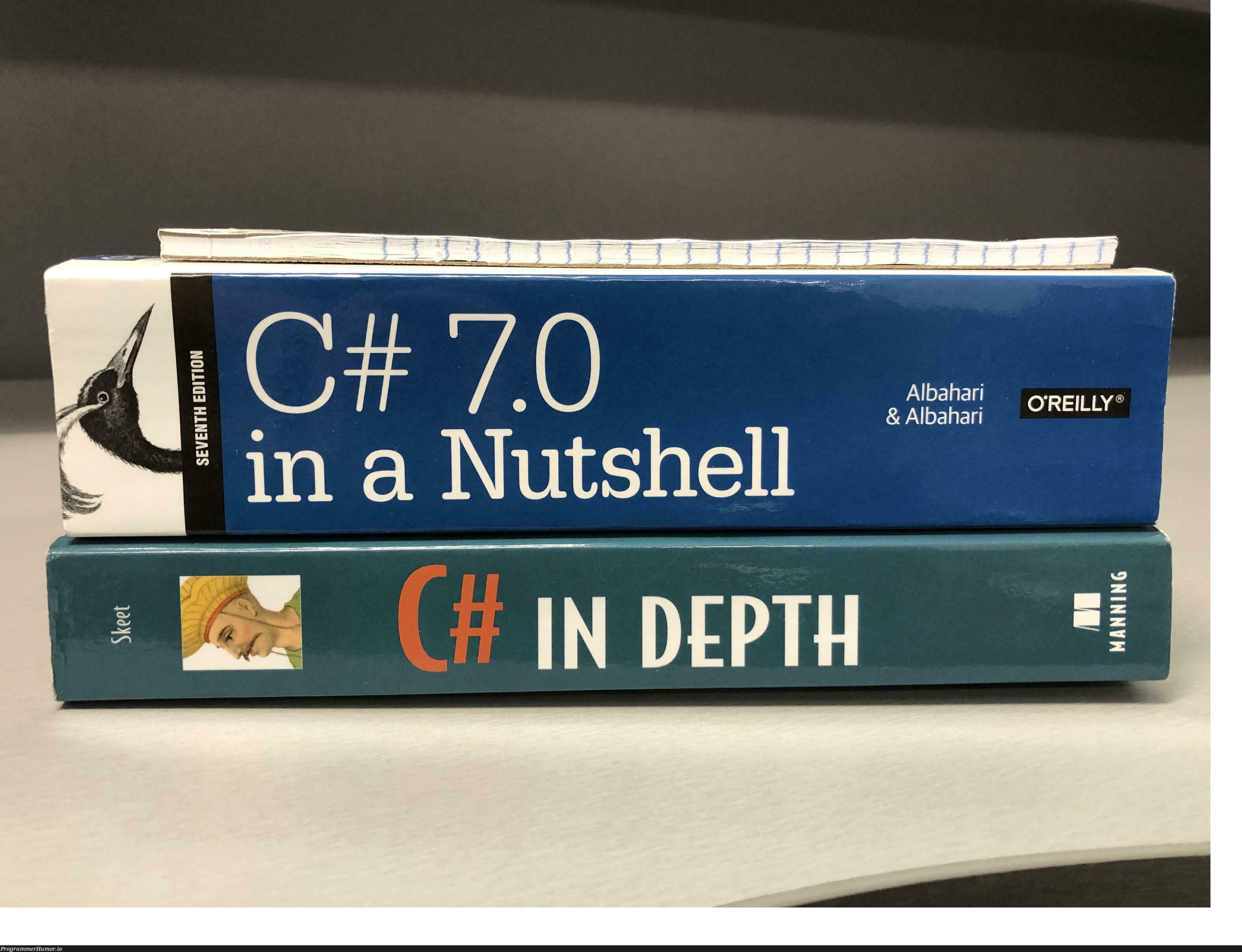 I feel like one of these books is misleading me | shell-memes | ProgrammerHumor.io